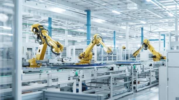 Planta industrial moderna com robôs de manufatura - Contabilidade para Indústrias